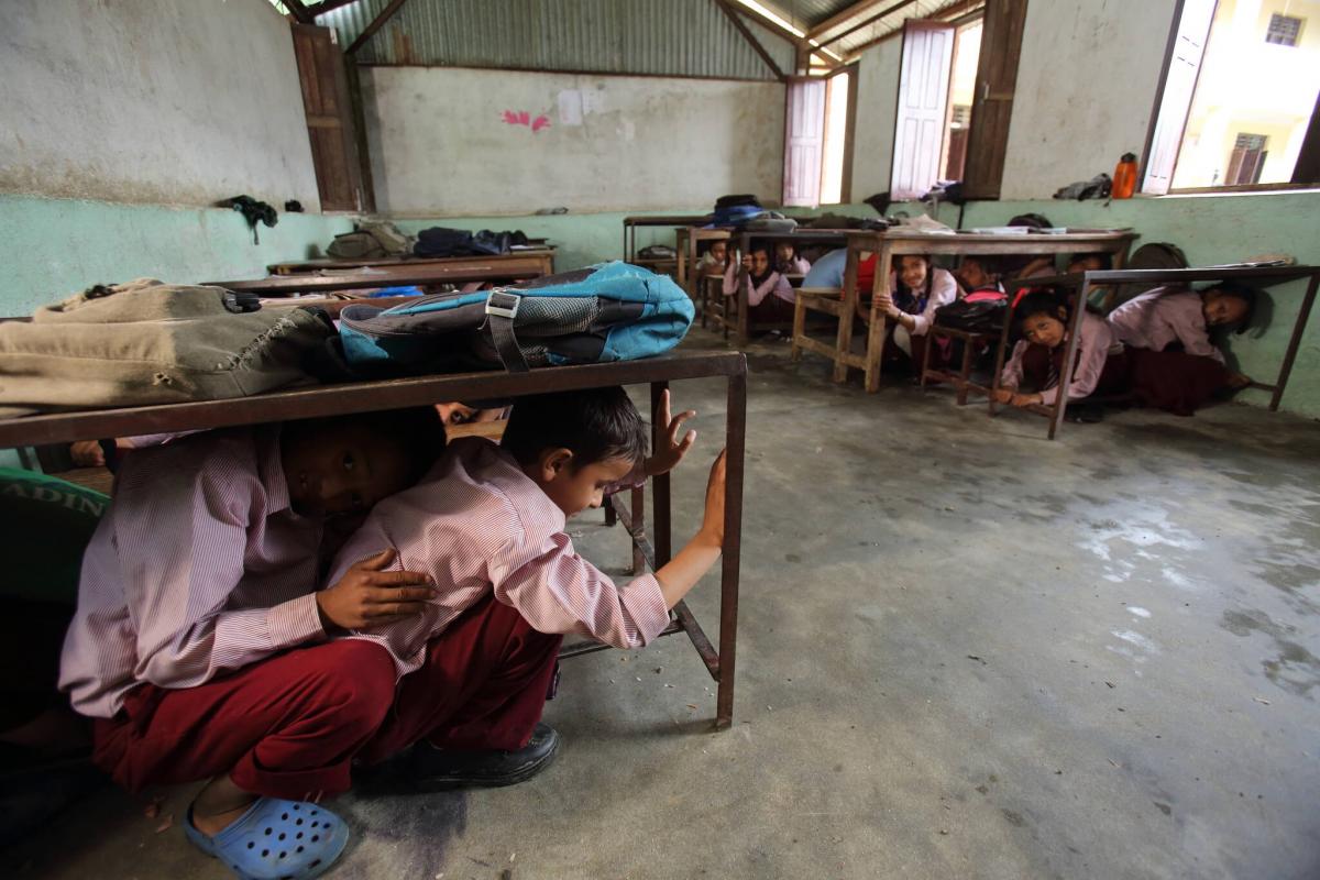 Students in Nepal practice earthquake preparedness. Photo credit: Jim Holmes for AusAID
