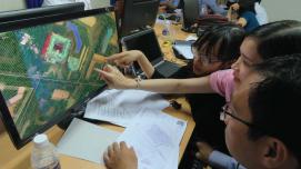 Local city officials and university students in Can Tho, Vietnam collaborate and learn about innovative mapping technology
