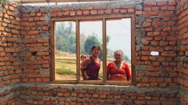 Women rebuilding a house in nepal