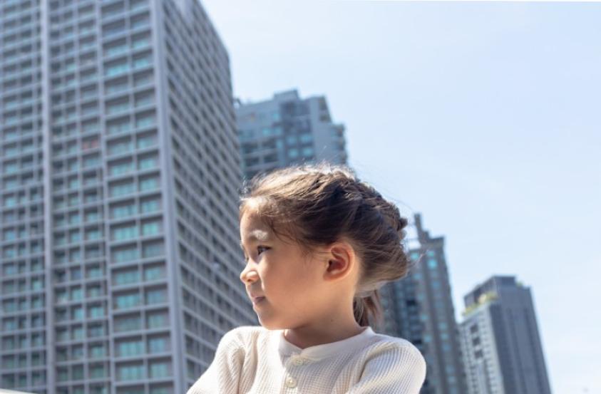 Child in a city