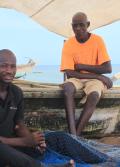 Fishermen work together, making nets to catch fish in Abidjan, Côte d'Ivoire (Credit: Zirra Banu/World Bank)