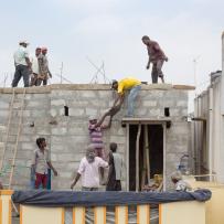 workers building a house